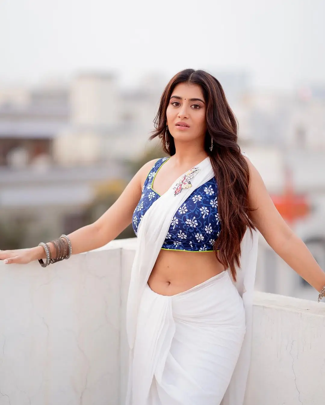 Rashi Singh in White Saree Blue Sleeveless Blouse